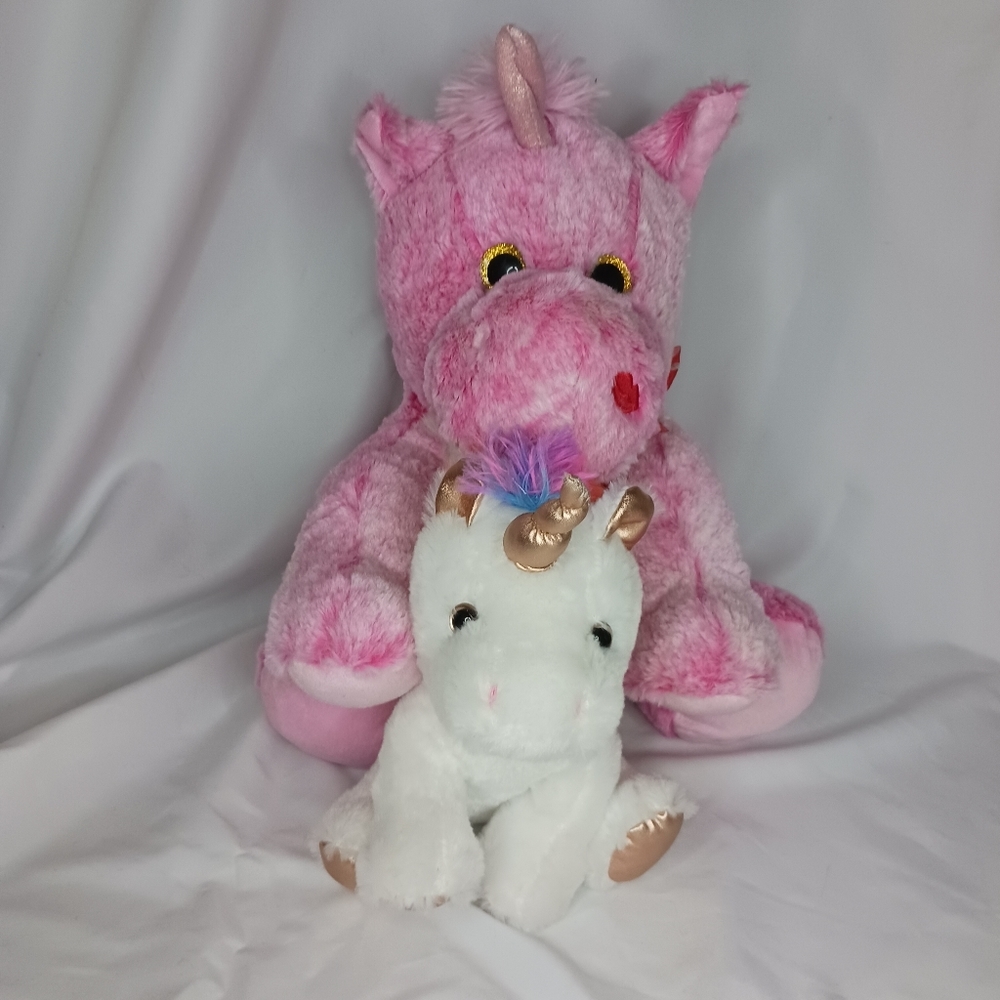 Two Unicorn Plushies.